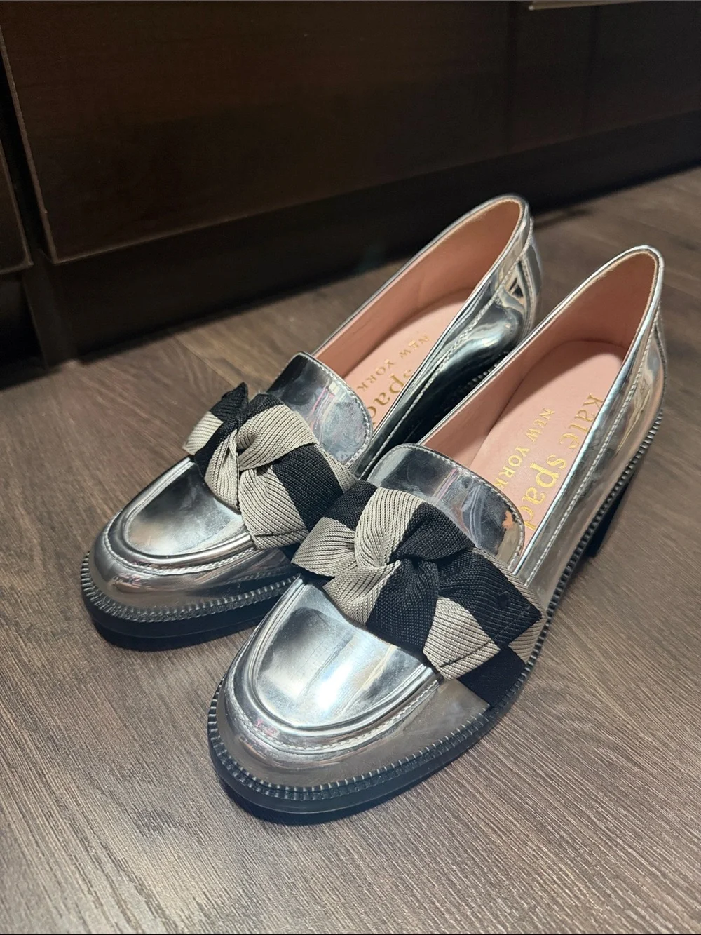 kate spade Metallic Silver Loafers with Black & Beige Bow Accent